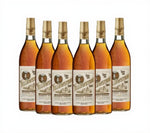 Six bottles of Yellowstone bourbon whiskey on a white background