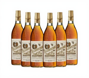 Six bottles of Yellowstone bourbon whiskey on a white background