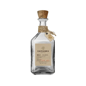 Cazcanes Blanco tequila bottle with cork stopper on a white background