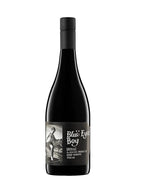 Wine bottle labeled 'Blu Eyed Boy' on a white background