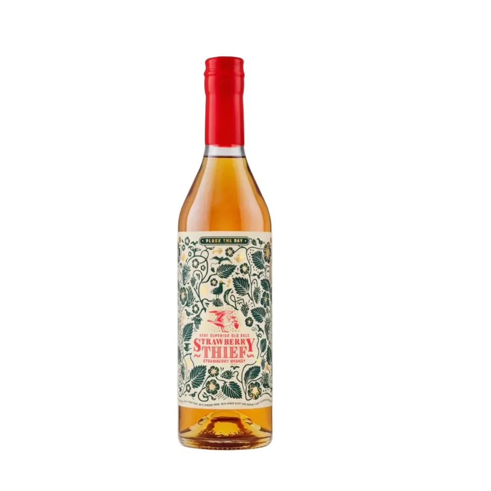 Bottle of Strawberry Thief wine with a decorative label on a white background