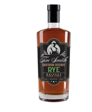 A bottle of Tim Smith Southern Reserve Rye Whiskey on a white background, showing the amber liquid and a black label with green and white text.